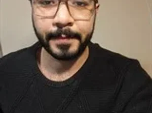 Ахмед Махер